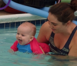 Watch a 7 month old baby learn to swim